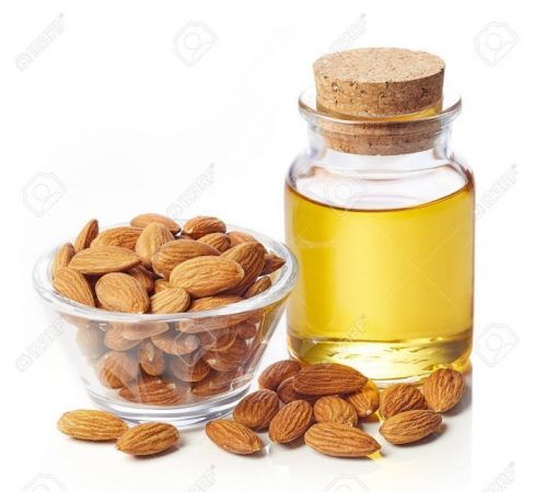 55245843 Bottle Of Almond Oil And Bowl Of Almonds Isolated On White Background 696x642