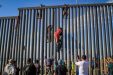 Migrants Climb The Wall In Northwest Mexico And Illegally Cross Into The Us