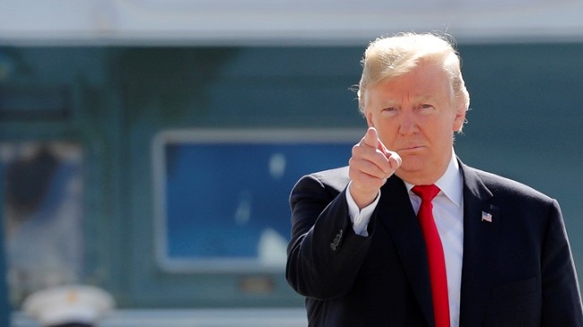 U.s. President Donald Trump Reacts As He Walks To Board Air Force One To Depart New York For Washington D.c. At John F. Kennedy International Airport In New York