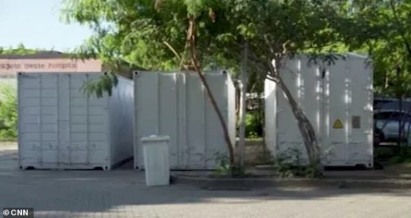30013176 8456329 Another Grim Scene Shows Three Containers Each Of Which Can Hold M 34 1593023904289