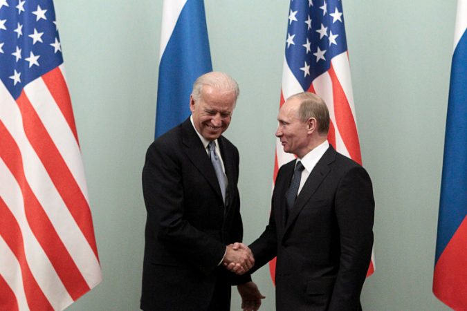 Russian Prime Minister Putin Shakes Hands With U.s. Vice President Biden During Their Meeting In Moscow