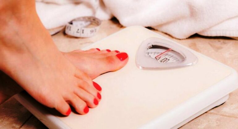 3f3c73c1 Woman On Scale 990x519 735x400 1