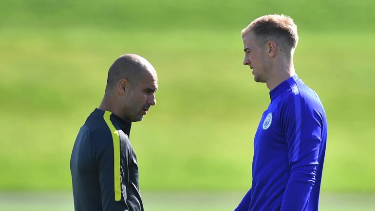 Joe Hart Talks With Mananger Pep Guardiola On Training Pitch In 2016