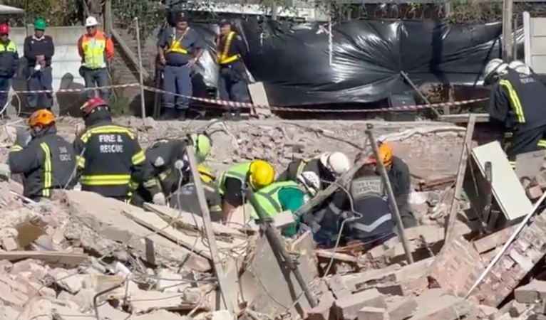 Worker pulled from rubble of collapsed building after five days ...