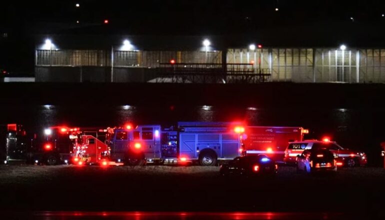 Washington/ Plane with 64 people on board collides with helicopter and ...