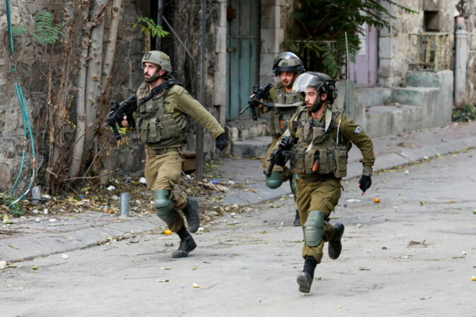 Palestinians Clash With Israeli Troops In Hebron