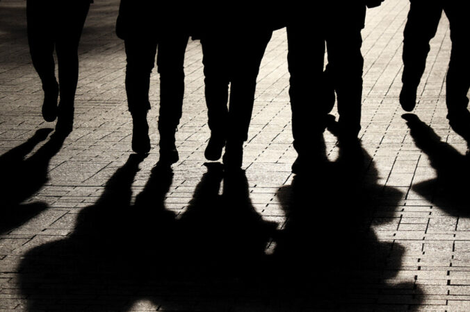 Silhouettes,and,shadows,of,people,on,the,street.,crowd,walking